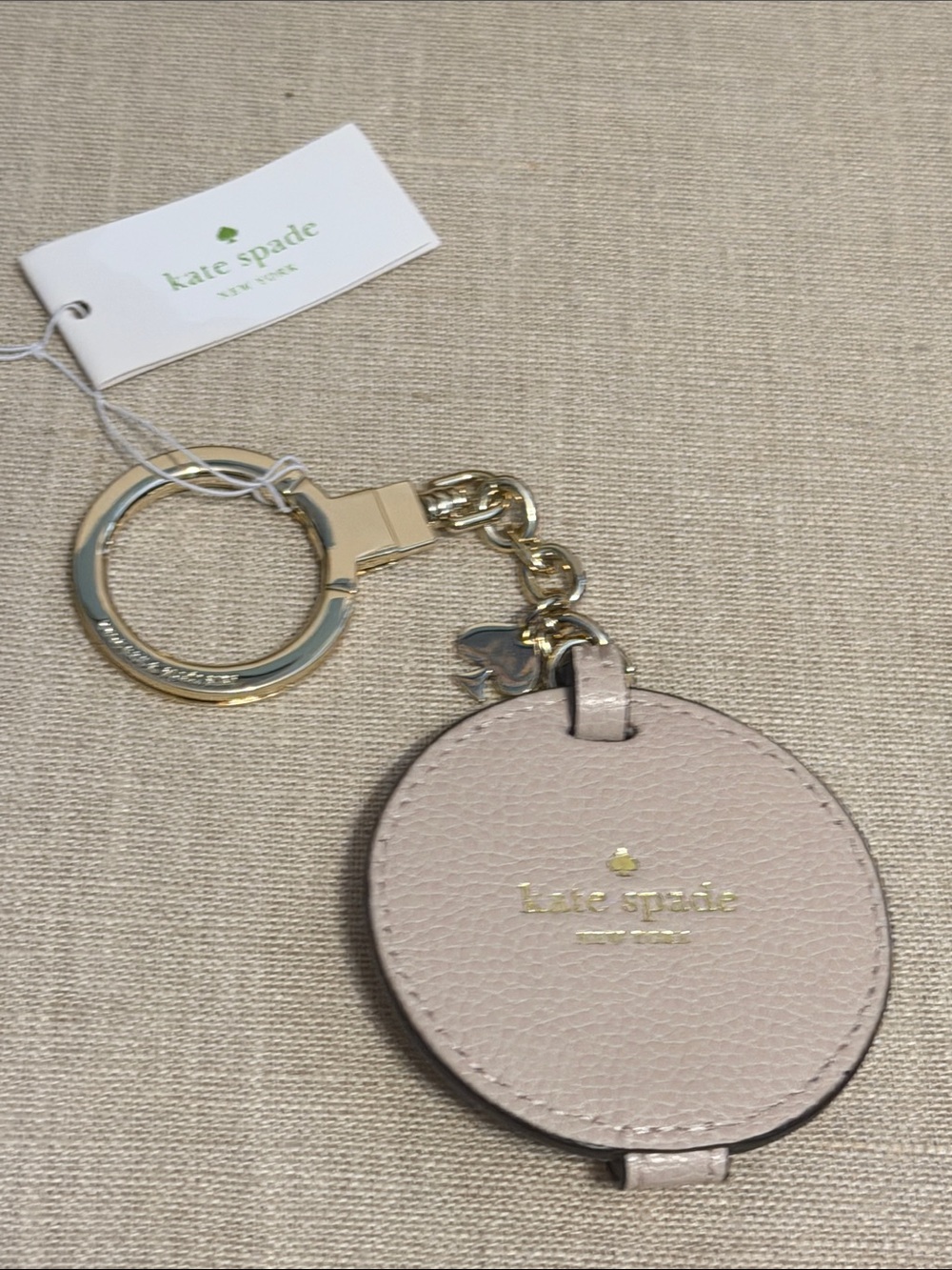 kate spade Blush Pink Pebbled Leather Round Mirror/Key Chain